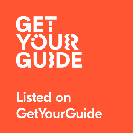 Logo of GetYourGuide on an orange background, with the phrase 'Listed on GetYourGuide' below.
